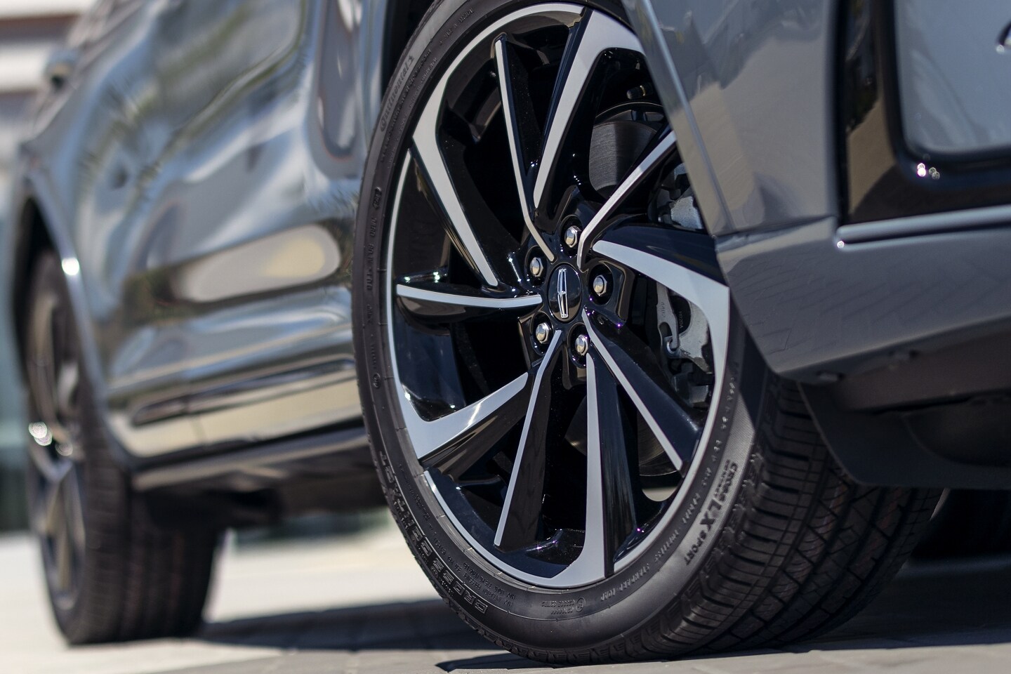 The available 20-inch wheels with Black Premium paint are shown on a 2026 Lincoln Corsair Grand Touring model