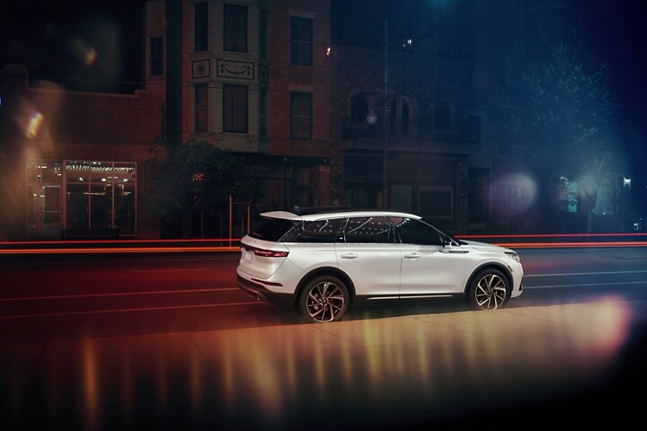 A 2026 Lincoln Corsair is parked in the city at night