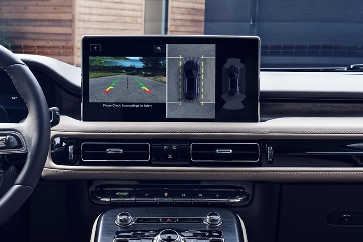 A 360-degree camera birds eye view is displayed on the center touchscreen inside a 2023 Lincoln Nautilus SUV