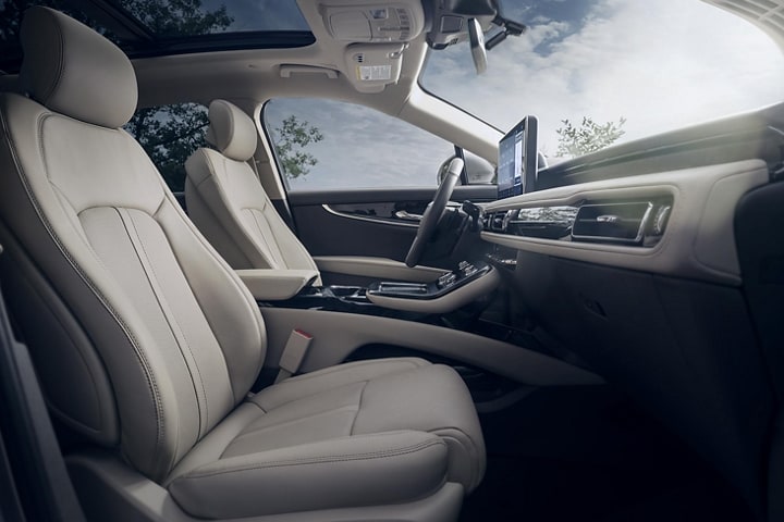 A close-up image shows the available leather trimmed front seats in a 2023 Lincoln Nautilus SUV