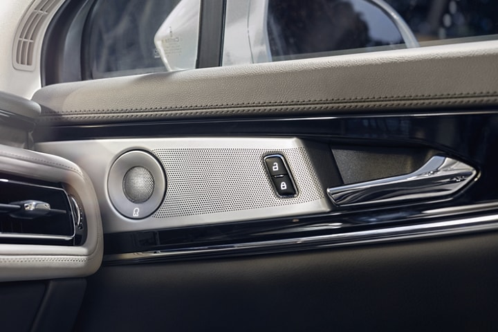 Two speakers of the available audio system in the interior of a 2023 Lincoln Nautilus SUV