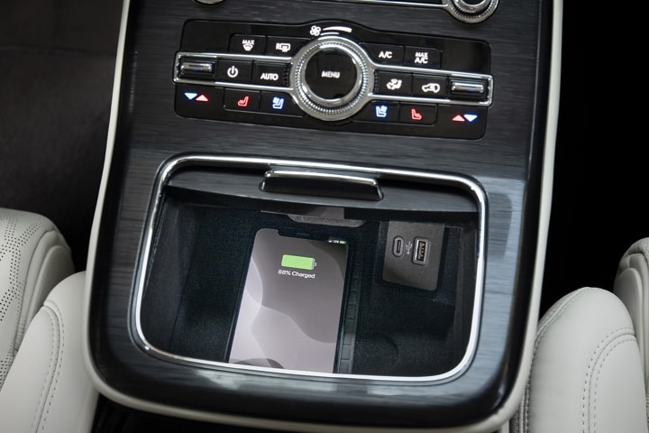 A smartphone is shown charging in a 2023 Lincoln Nautilus Reserve SUV