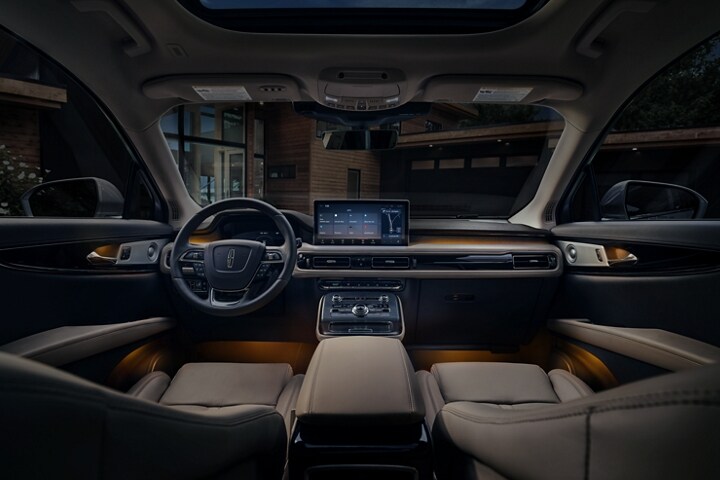 The orange ambient lighting inside a 2023 Lincoln Nautilus SUV in creates a soft glow