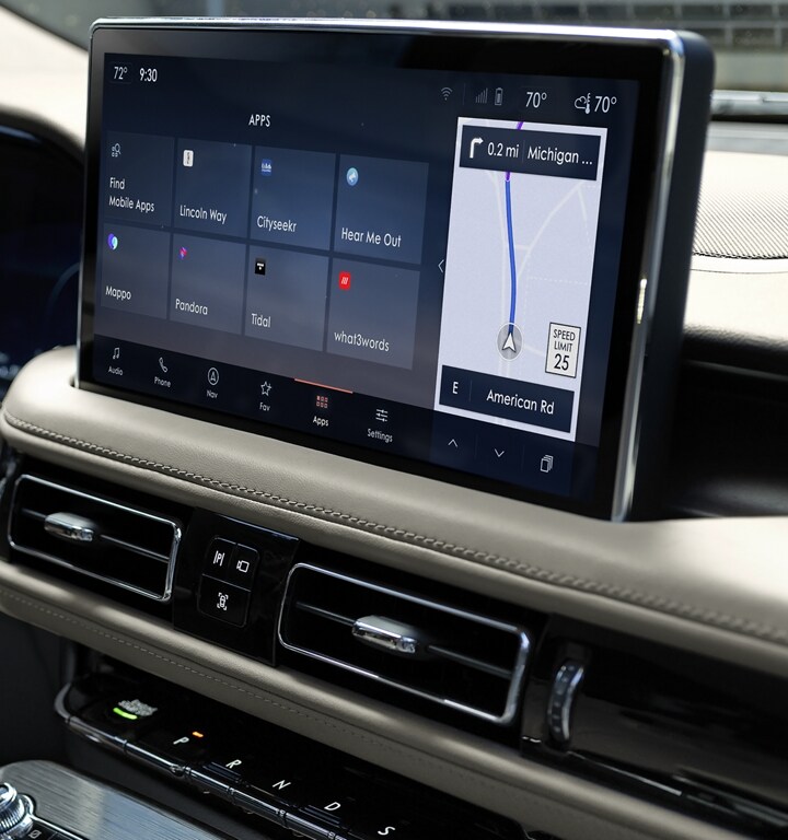 The SYNC® 4 AppLink® home screen is displayed on the center touchscreen of a 2023 Lincoln Nautilus SUV