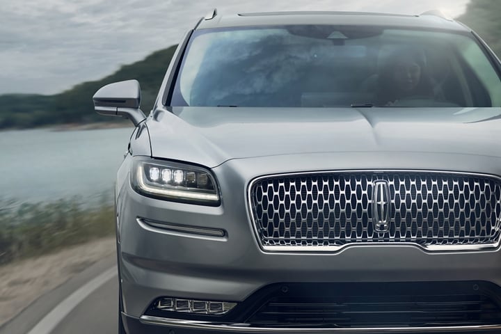 A close-up image of the available full multi projector headlamps of the 2023 Lincoln Nautilus SUV