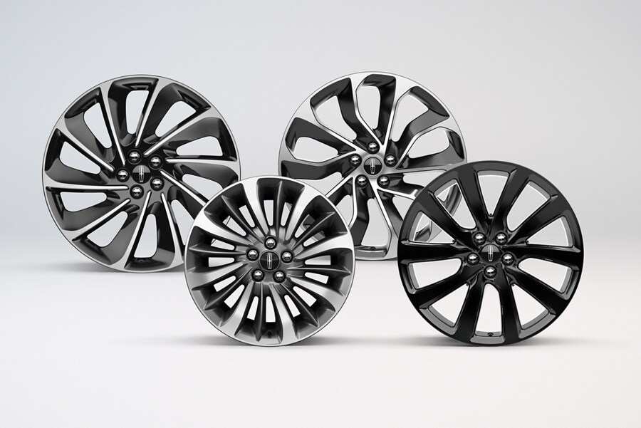 An array of standard and available 18″, 20″ and 21″ wheels is shown
