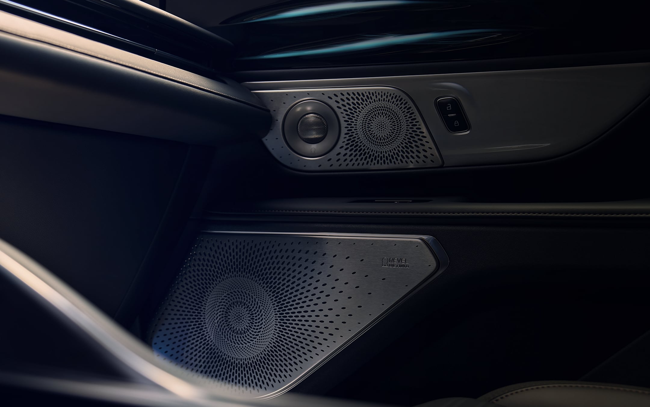 A speaker cover of the 28-speaker available Revel® Ultima 3D Audio System dazzles with great detail