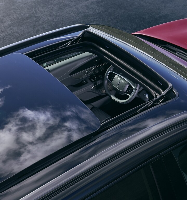 Overhead shot of a 2024 Lincoln Nautilus SUV with the Panoramic Vista® Roof open