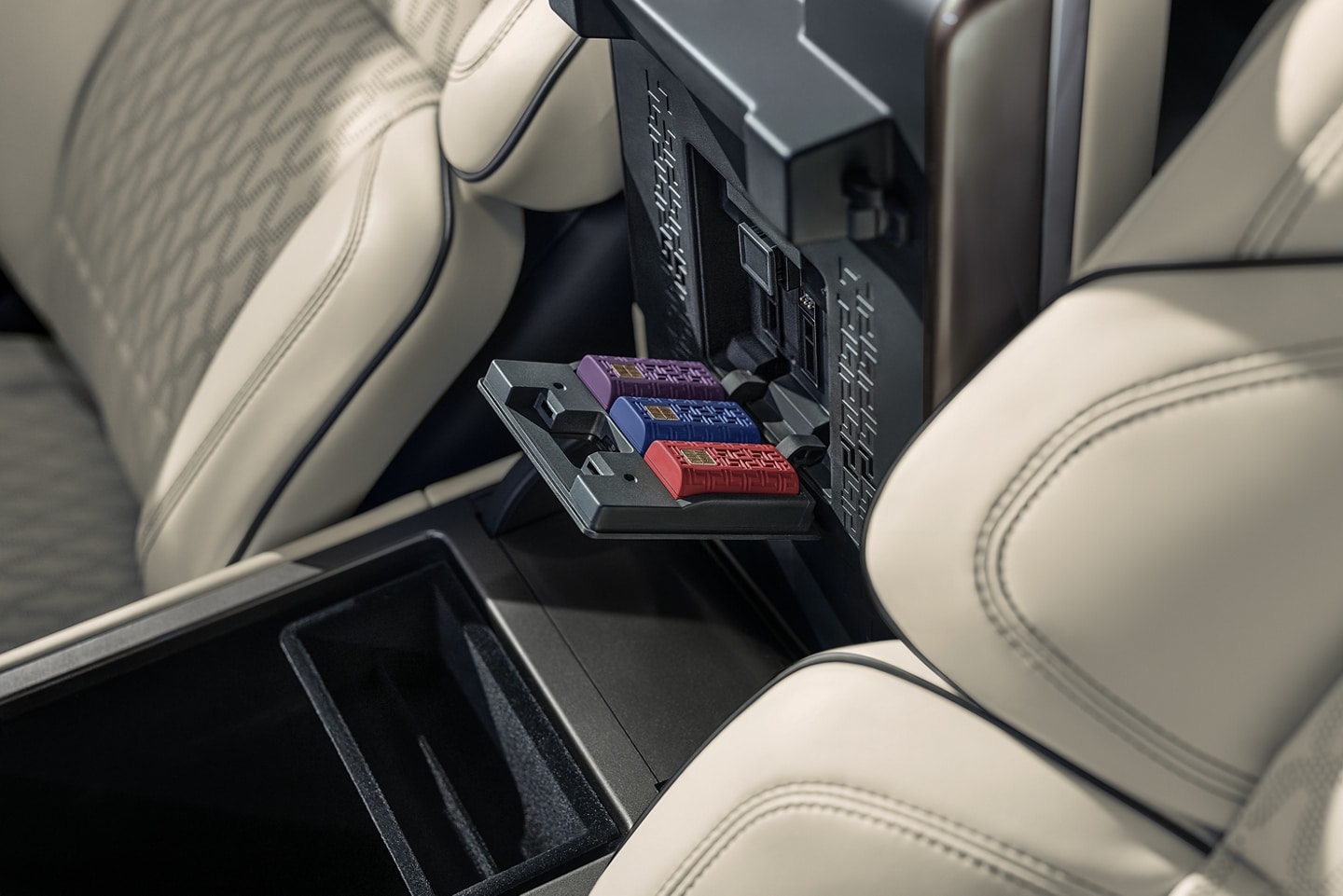 Digital Scent cartridges are shown inserted within the front armrest