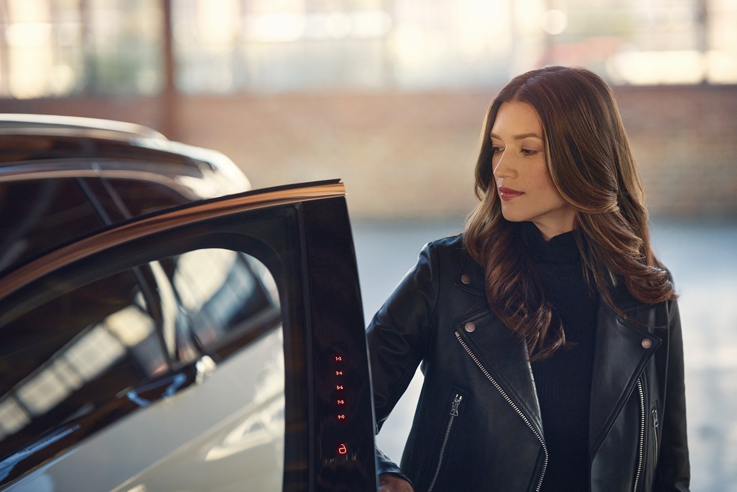 The keyless entry pad is illuminated on the door frame of a 2025 Lincoln Black Label Nautilus