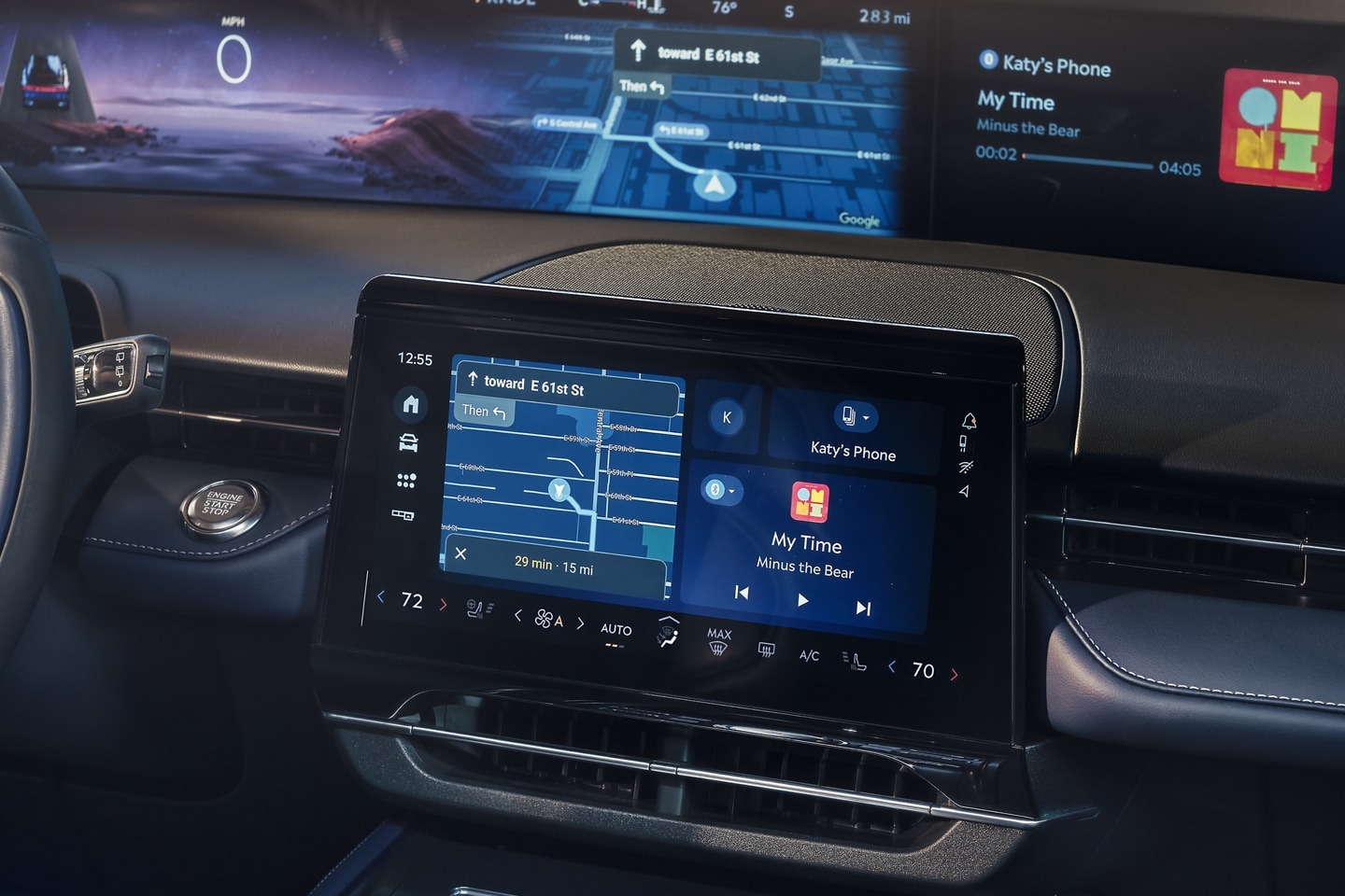 Turn-by-turn driving directions are shown on the panoramic display