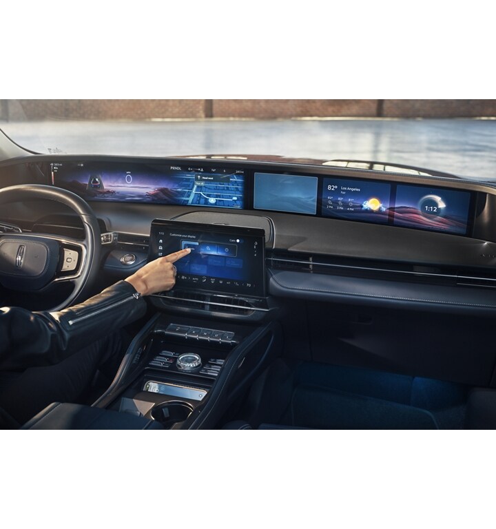 Two screens span the dashboard displaying an array of helpful and customizable information