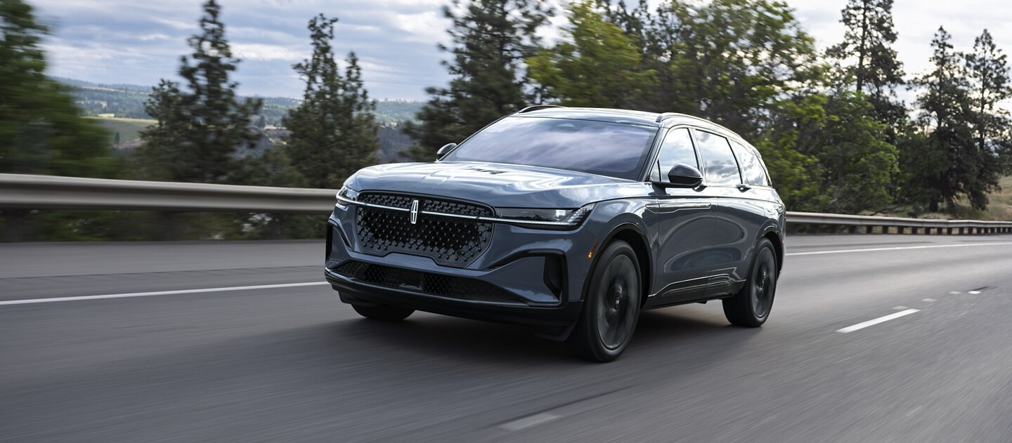 2026 Lincoln Nautilus Reserve model driving down a highway