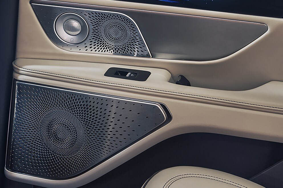 An arrangement of Audio system speakers positioned in the driver's door of a 2026 Lincoln Nautilus