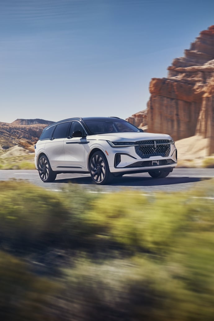 The 2025 Lincoln Nautilus® driving down a road in the desert