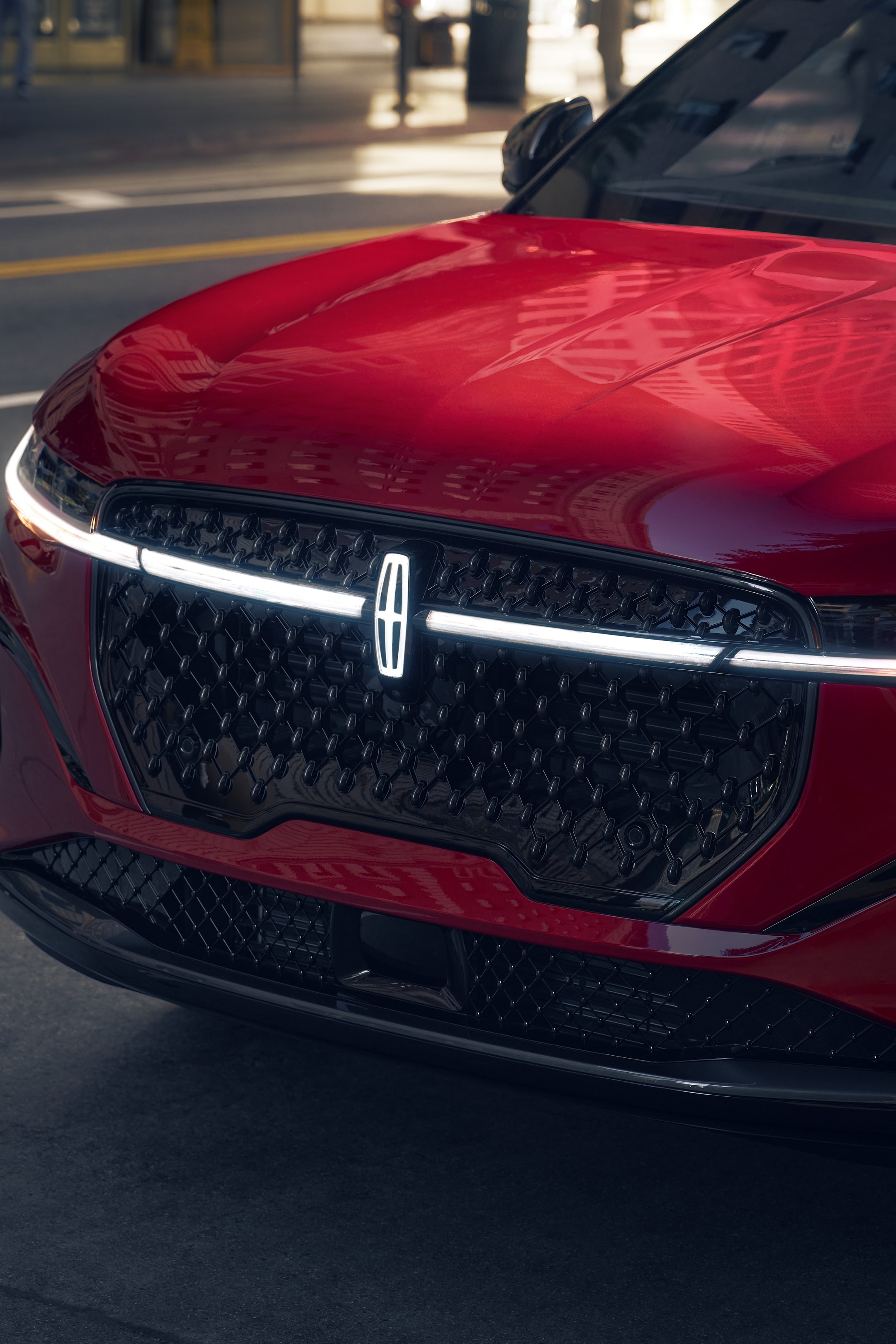 A 2026 Lincoln Nautilus with Jet Apperance Package parked while the Lincoln Embrace welcome sequence occurs