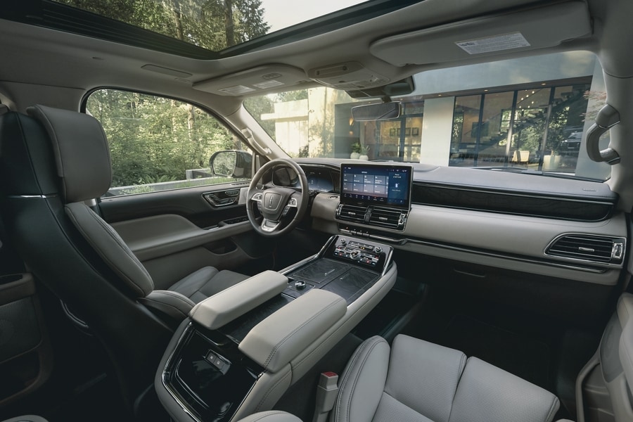 The front cabin of a 2023 Lincoln Navigator model highlights comfort and style