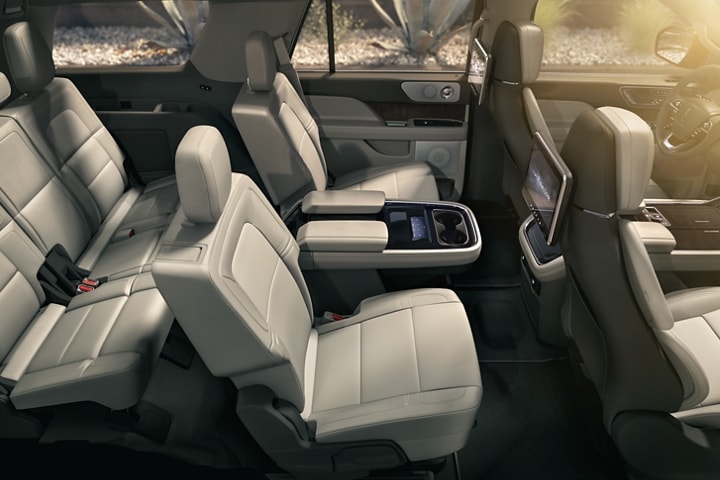 The spacious 2nd  and 3rd row of a 2023 Lincoln Navigator SUV hints towards the promise of ample leg room