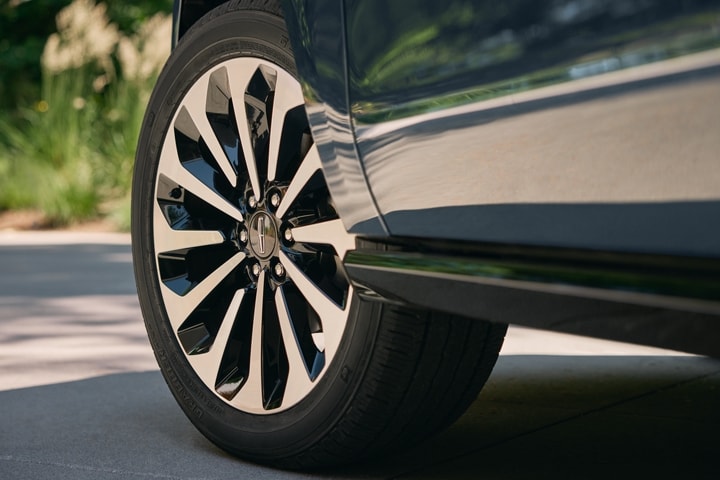 A detail shot of the Lincoln 22”12-spoke Bright- Machined Aluminum wheels