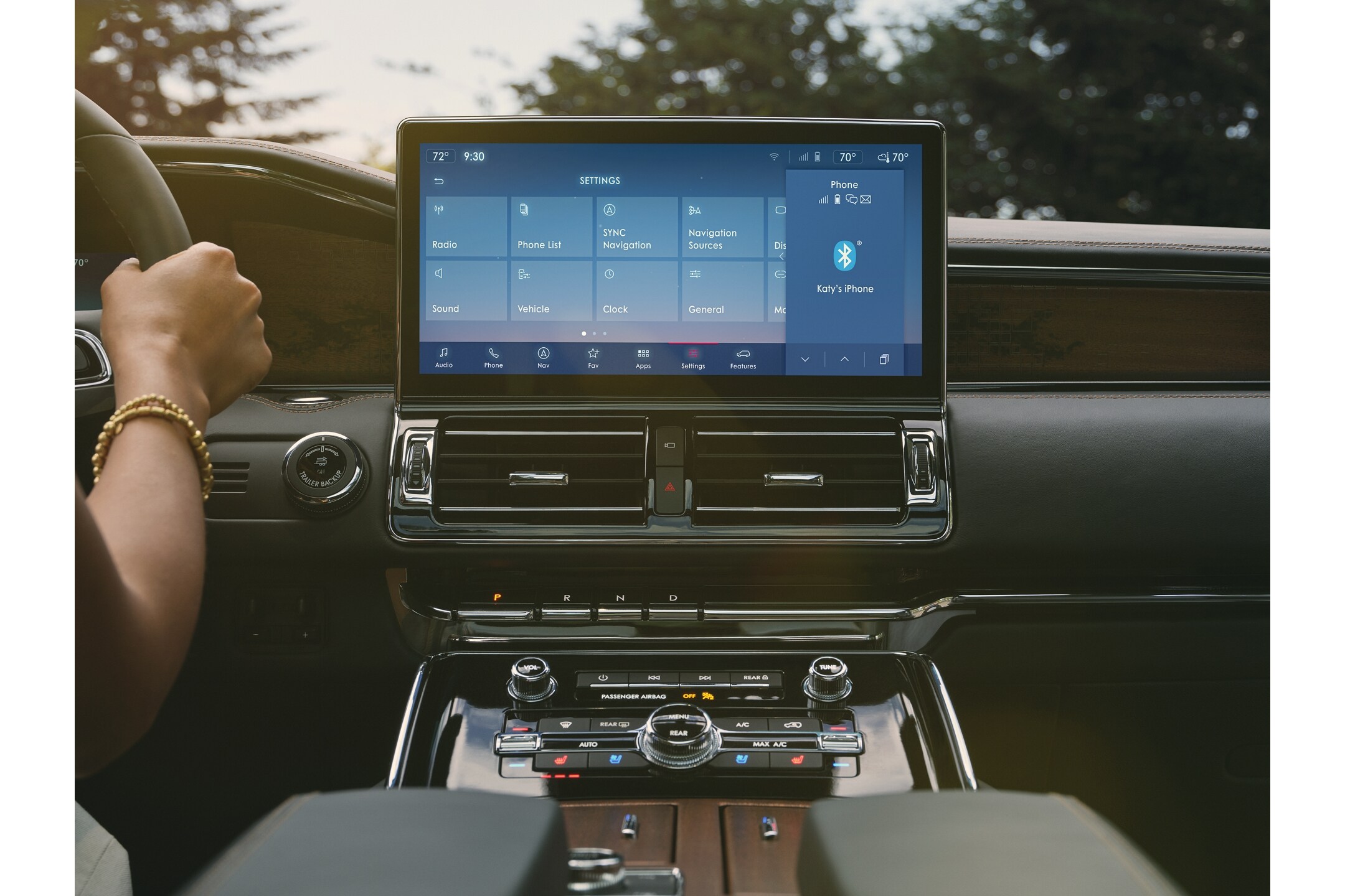 The 13.2-inch LCD center touchscreen shows the SYNC® 4 interface that pulls your mobile device view on screen.