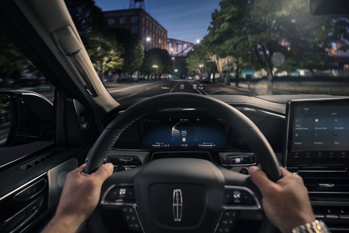 The Head-Up Display projects driver information above the steering wheel at night