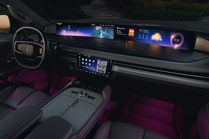 The interior of a 2025 Lincoln Navigator® is filled in violet ambient light
