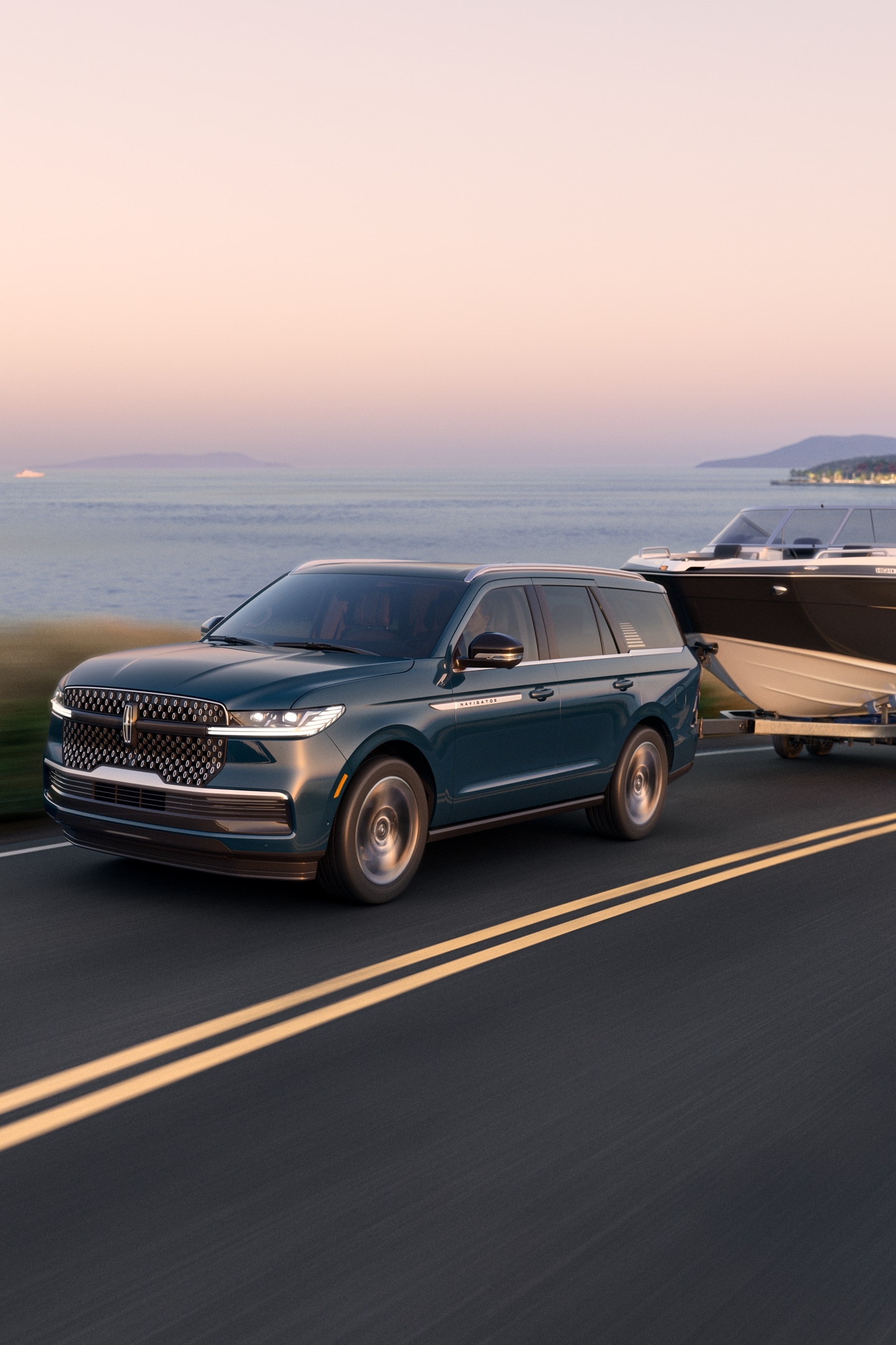 A 2025 Lincoln Navigator tows a large boat
