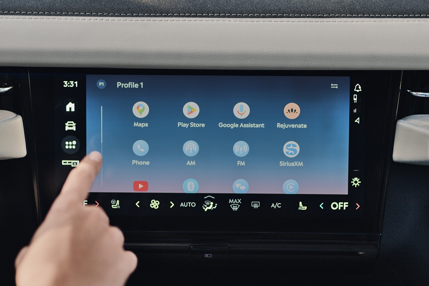 A person touches the centre touchscreen of a 2025 Lincoln Navigator SUV
