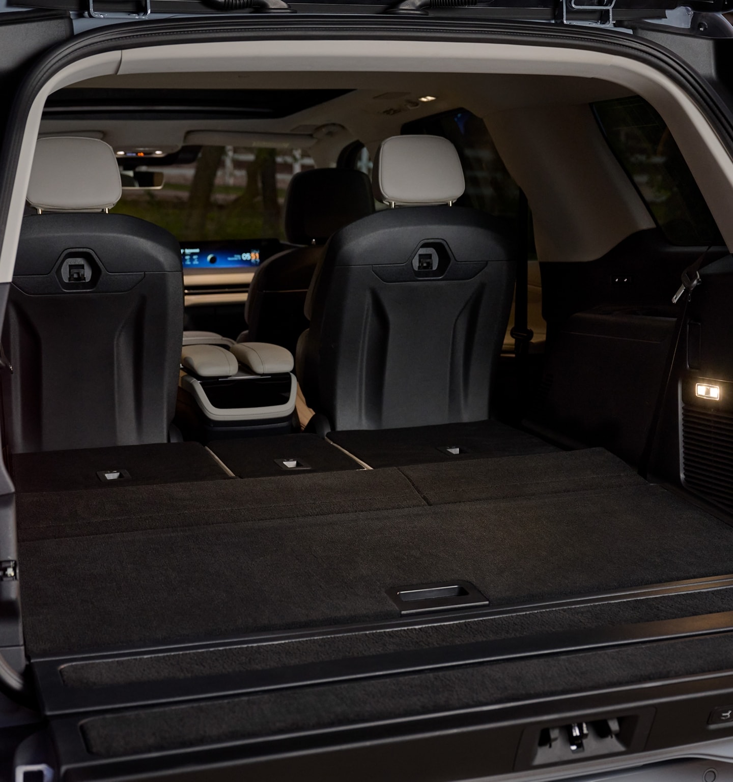 A rear view shot of a 2025 Lincoln Navigator with the third-row folded down for more cargo space