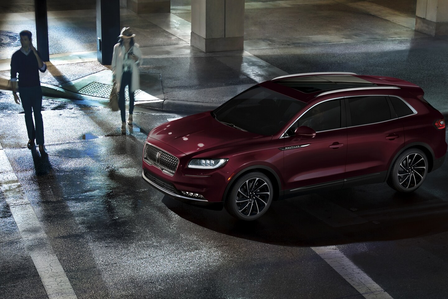 A 2023 Lincoln Nautilus® SUV is shown at a pedestrian crosswalk to suggest the benefit of Automatic Emergency Braking